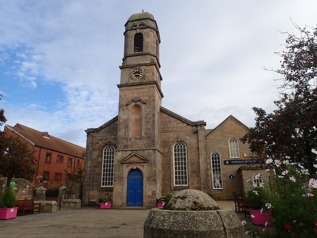 Eyemouth Museum, in the old kirk with its clock tower and blue door